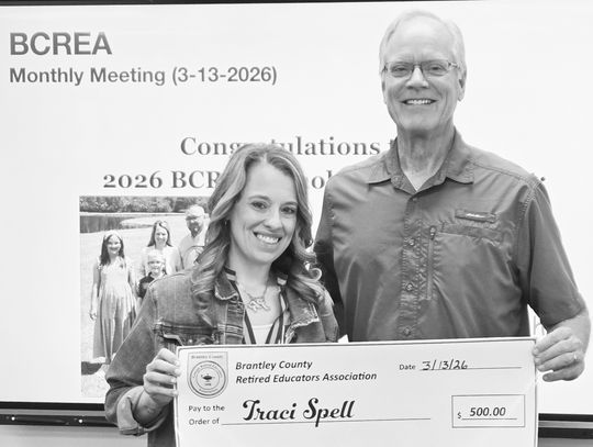 BCREA gifts scholarship to Spell