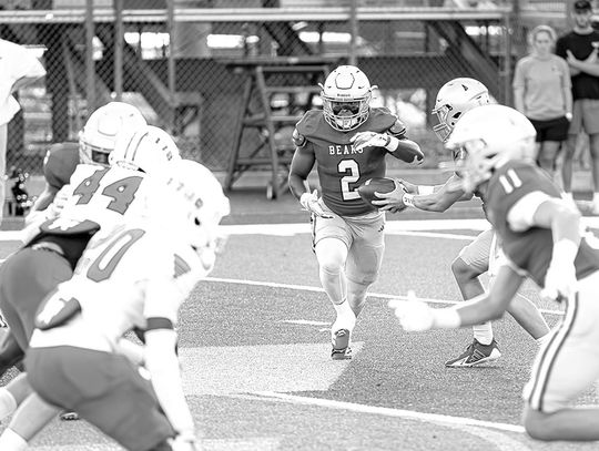 Bears’ run game powers by Glynn Acad.