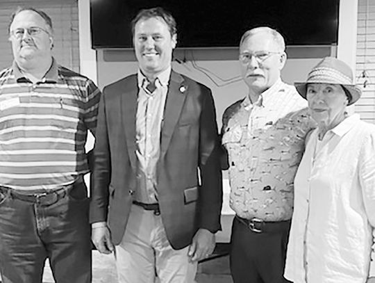 Burchett (R) speaks at GOP meeting