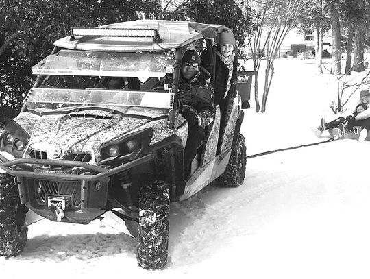 Carter family enjoys snow