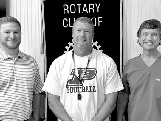 Coach Herring talks team building with Rotary Club