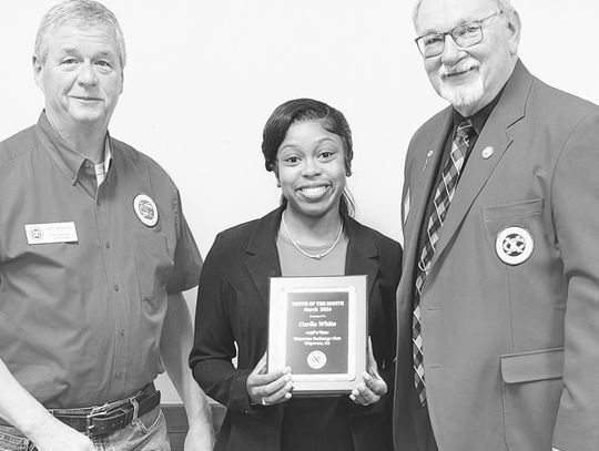 Exchange honors White