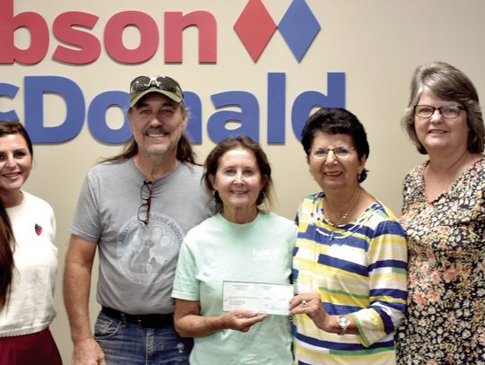 Gibson McDonald donates to Allmon animal rescue Gibson McDonald donates to Allmon animal rescue