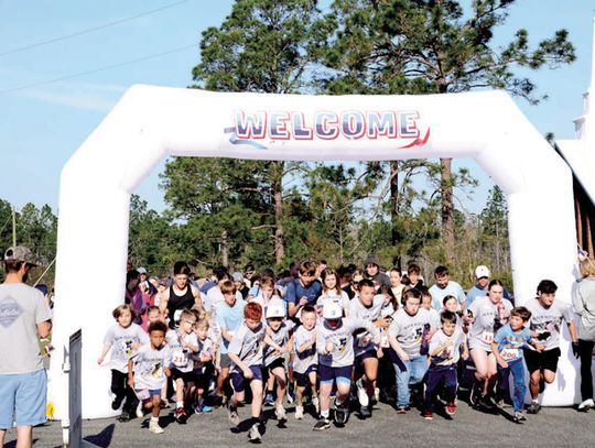 Heron Hustle fundraiser draws large crowd of runners