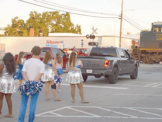Homecoming parade delayed by train as it ‘tracks’ through Monday