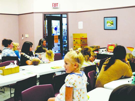 Kids learn about sunflowers at library