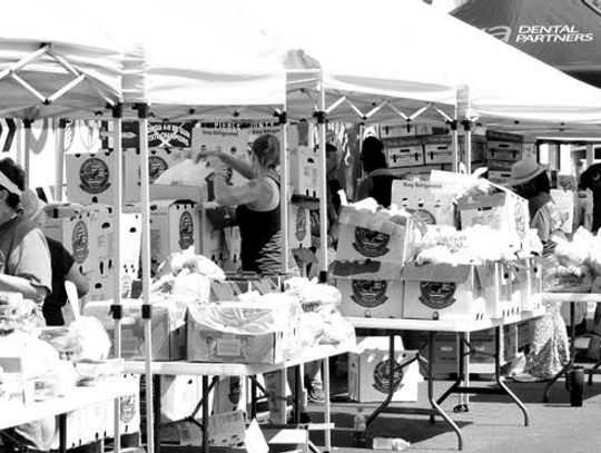 Pierce Food Pantry drive through endures the summer heat