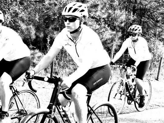 Riders for youth home coming through Pierce