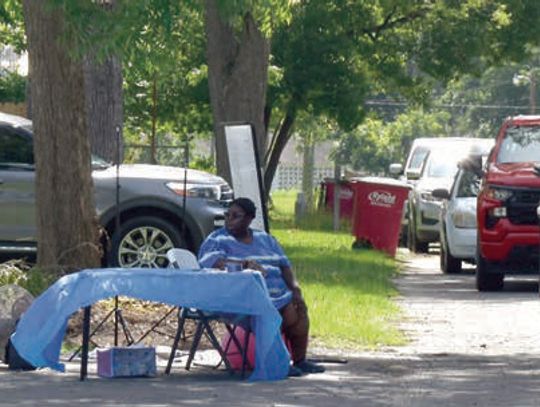 Senior Center drive through gives out healthy produce and ice cream
