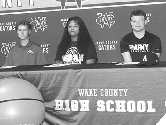 Seven WCHS athletes sign to play collegiately