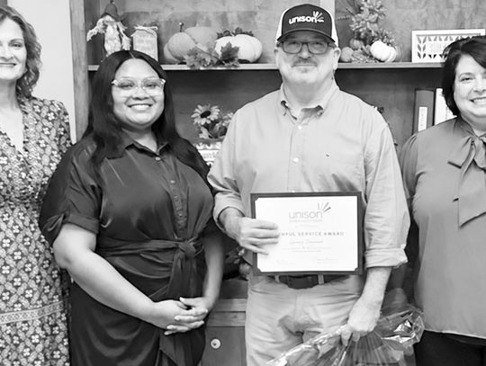 Tanner recognized for 20 years