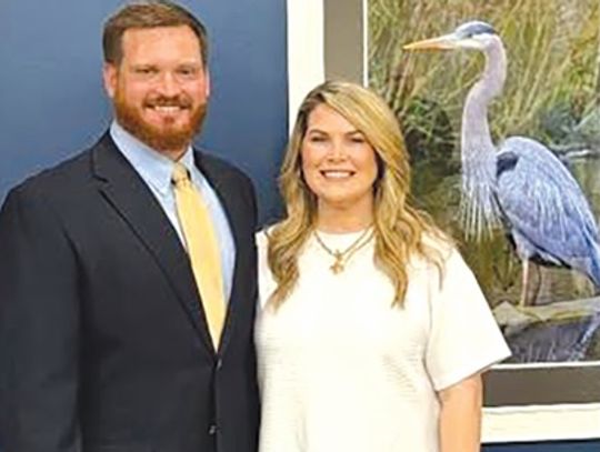 Three-time state champ coach returning home