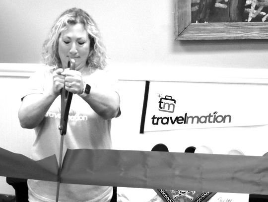 Travelmotion cuts a ribbon and supports literacy Travelmotion cuts a ribbon and supports literacy