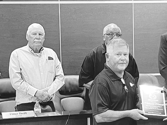 Ware honors Houseal’s service