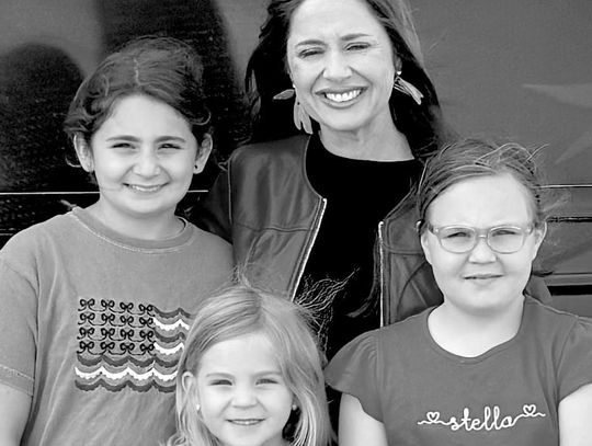 Young fans get a picture with Taylor