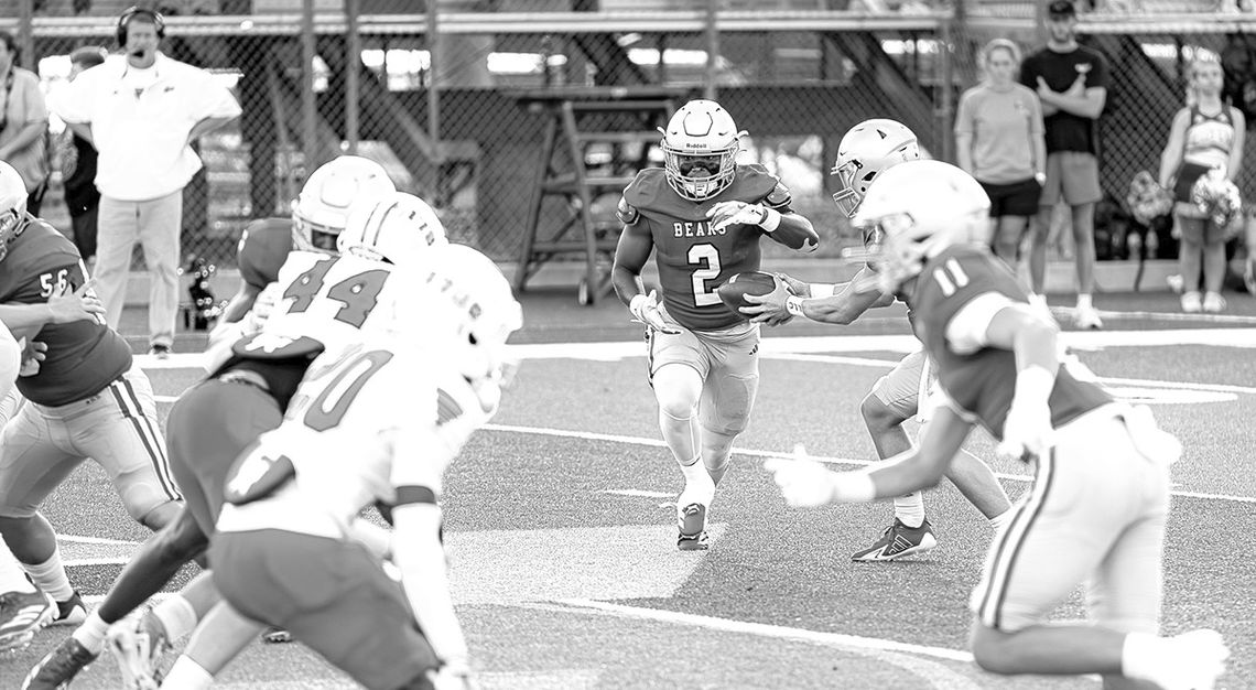 Bears’ run game powers by Glynn Acad.