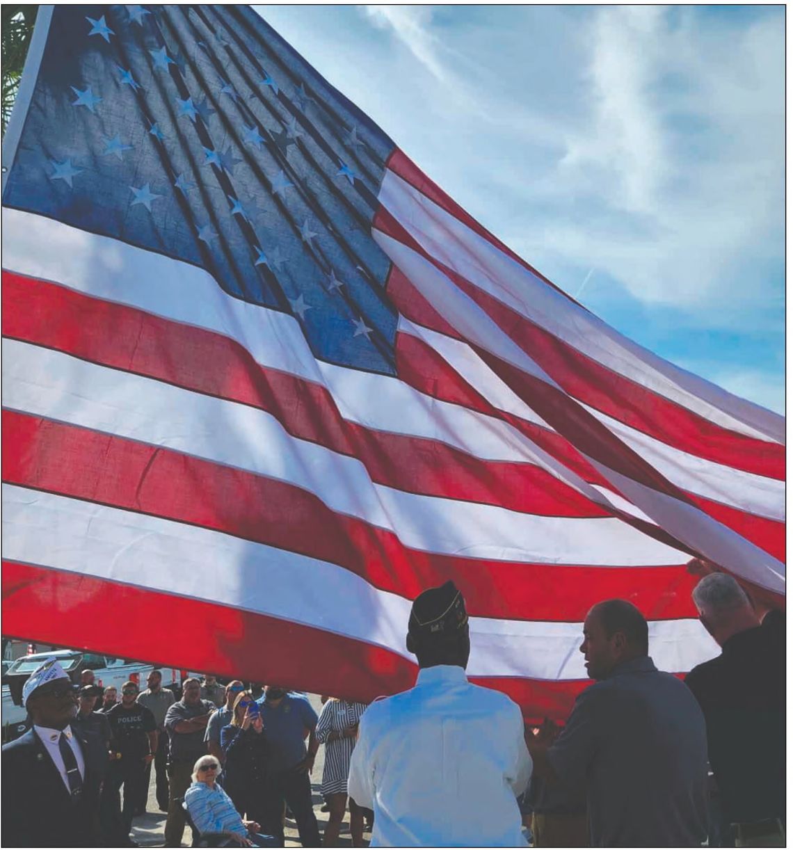 Flag raising ceremony honors 9-11 victims Flag raising ceremony honors 9-11 victims