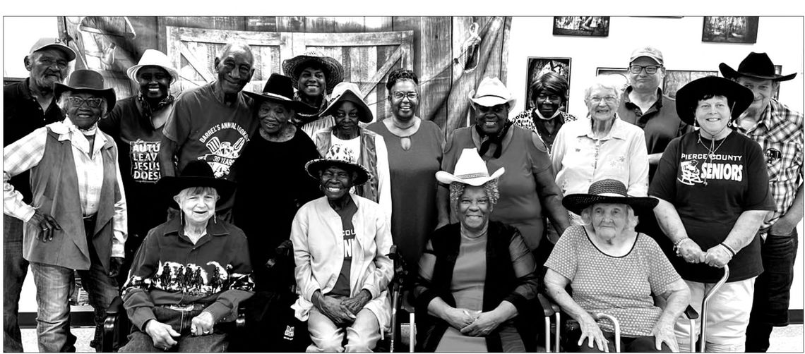 Isaac Moses helps local seniors celebrate Cowboy Day