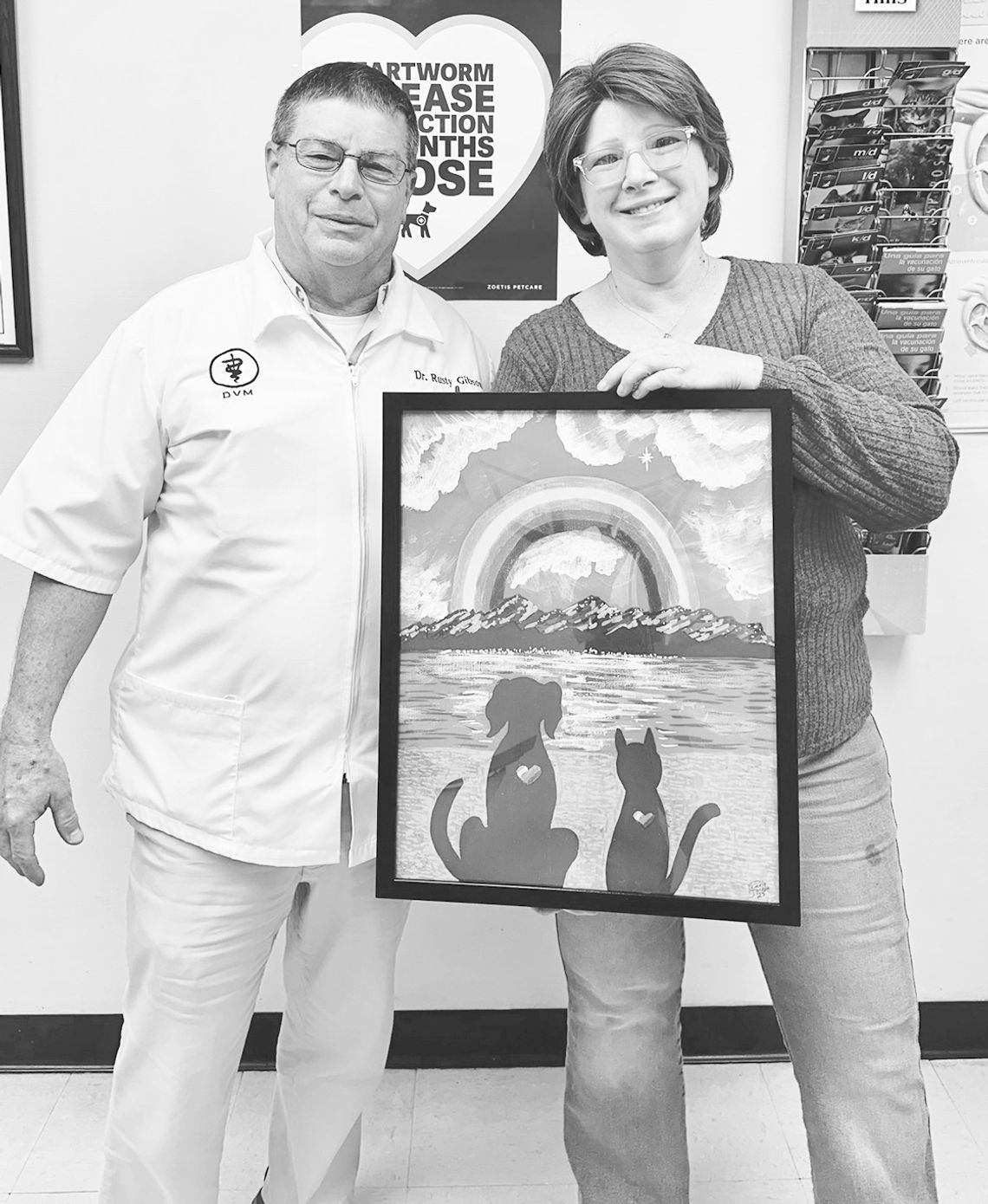 Jordan presents heartfelt print to Dr. Russell Gibson