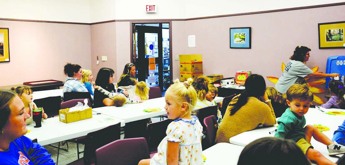 Kids learn about sunflowers at library Kids learn about sunflowers at library