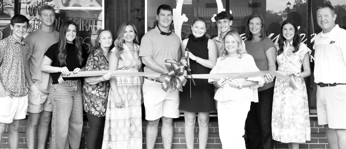 New Chamber member Occasions cuts ribbon New Chamber member Occasions cuts ribbon