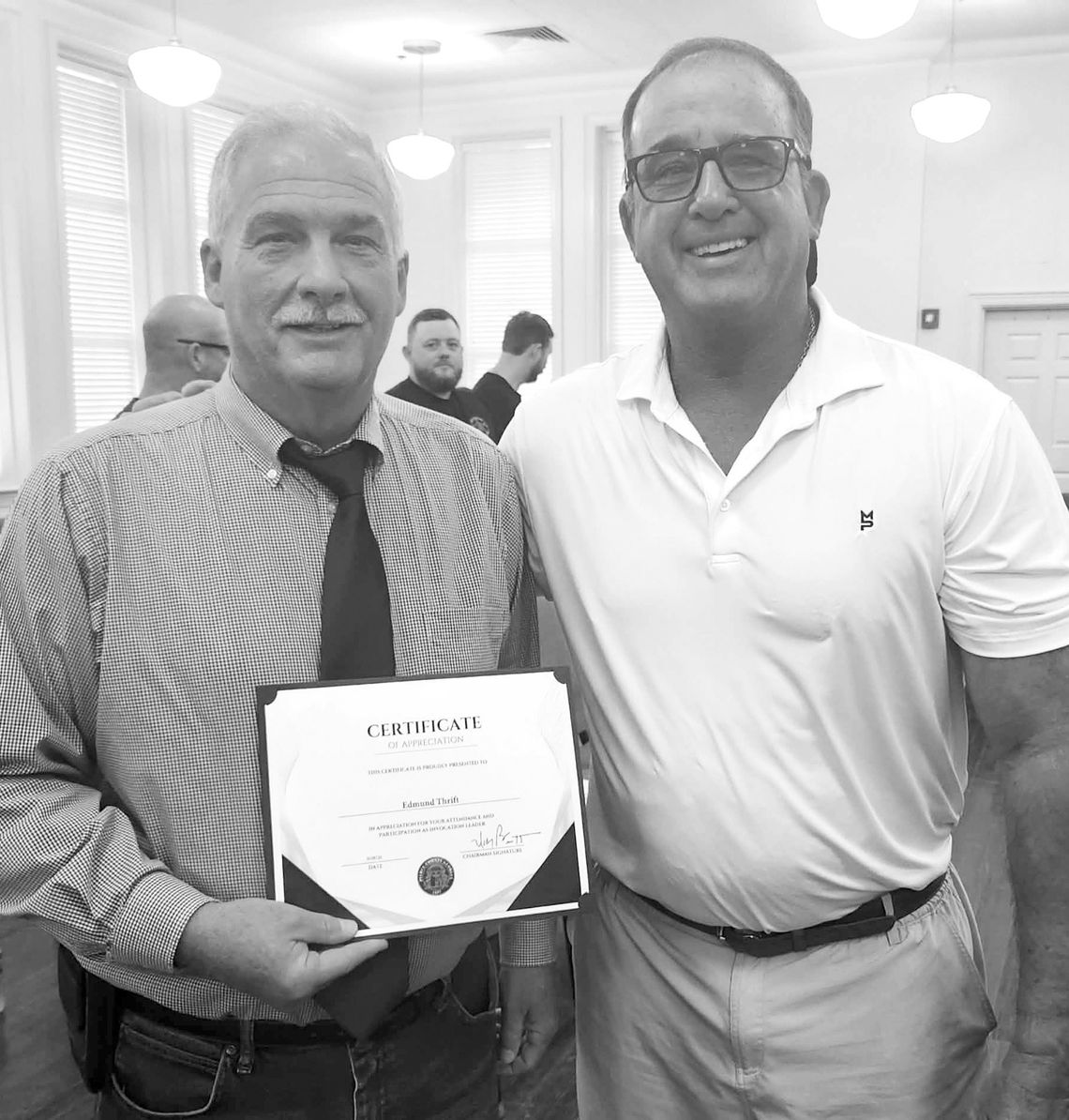 The Rev. Thrift prays The Rev. Thrift prays