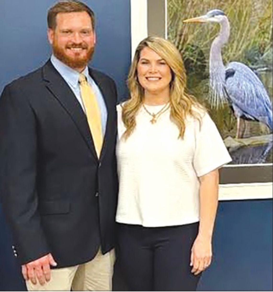 Three-time state champ coach returning home