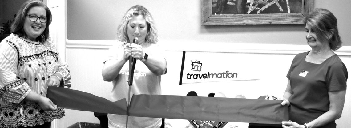 Travelmotion cuts a ribbon and supports literacy