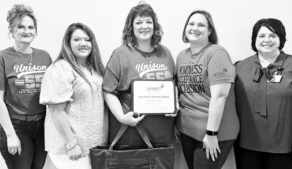 Unison honors Taylor Unison honors Taylor