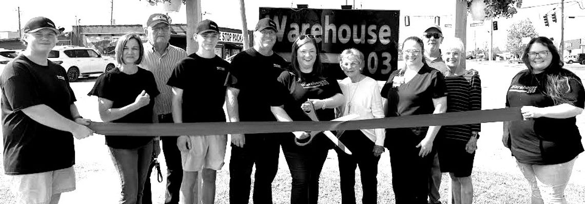 Warehouse 203 holds ribbon cutting