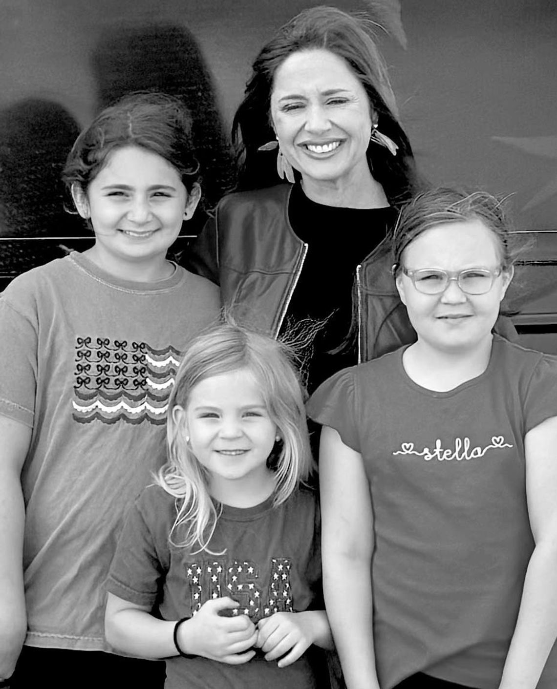 Young fans get a picture with Taylor