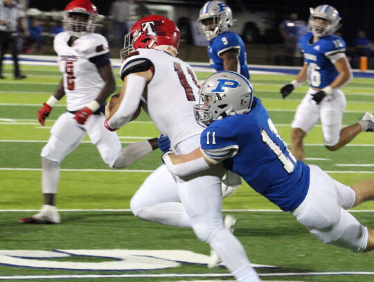 <p>Bear linebacker Wade DiBiase makes a diving tackle on the Toombs County ball carrier.</p>