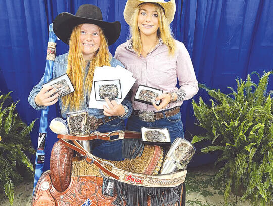 <p>Joelee and Karis Griffin of Mershon are shown following a recent rodeo they participated in.</p>