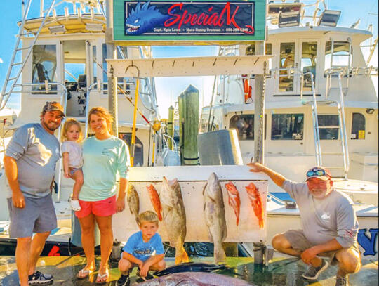 <p>Garrett Thornton, with his wife, Tori, holding daughter, Finley, son, Gage and Garrett’s father, Kerry, are shown with the Warsaw grouper Garrett caught to win the 74th annual Destin, FL Fishing Rodeo.</p>