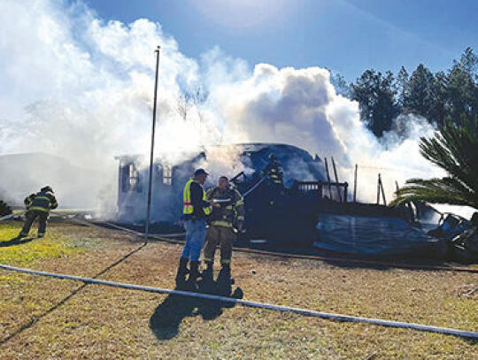 <p>A home on Big House Road was destroyed by fire Friday morning. A GoFundMe page has been set up to assist the residents of the home. -Photo courtesy Merlene Crosby, Pierce County Volunteer Fire Department</p>