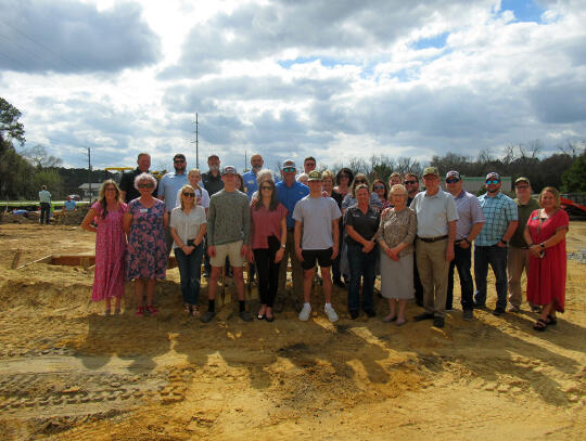 A large group including James and Brittany Weathersby and the Weathersby family, Concept 99 associates and chamber of commerce and Better Hometown members were present for the ground breaking.