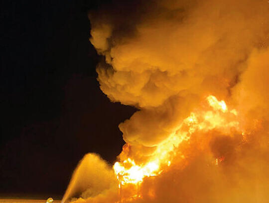 A firefighter battles the flames of a house fire last week on Tyre Bridge Road.