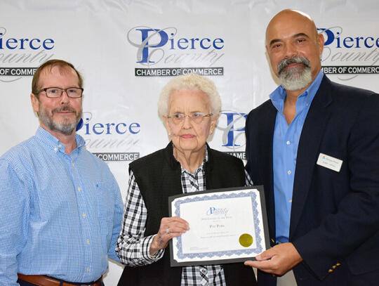 Longtime Pierce County educator Pat Park was named Citizen of the Year at the Chamber of Commerce’s 2022 Community Awards Press Conference last Thursday, March 28. Pictured (l-r) are LeVance Gay, Pat Park and Bobby Tippins.  (See more photos on page 6)