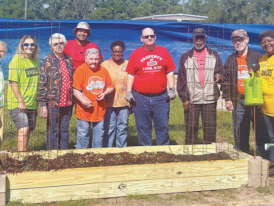 The Senior Center garden crew includes from l-r Sierra Strickland, Karen Herndon, Vina Howell, Emanuel Williams, Barbara Thornton, Sandra Clark, Jerry Tyson, Charles Daniels, Terrell Tuten and Lynn Platt.