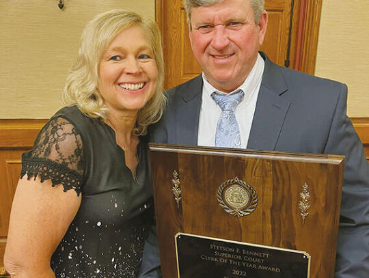 Clerk of the Court Thomas Sauls received the Stetson F. Bennett Jr. Superior Court Clerk of the Year Award for 2022 last week. He is shown with his wife, Donna.