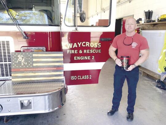 Photo by JIM BLACKBURN JR.Lt. Lance Card placed first in the 40-and-above age group and 19th overall at the 2023 Central Georgia Firefighter Combat Challenge earlier this month.