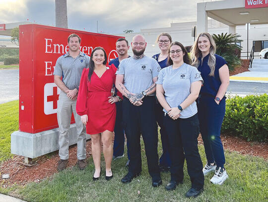 Shown front row (l-r) – ED Director Ashton Poole, Logan Mercer – Paramedic, Rhiannon Strickland -EMT, Pierce County EMS Director Blake James, Dalton Johnson – Paramedic/RN, Niki Perritt – Paramedic/RN, Kearington Moore – Nurse Extern.