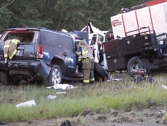 First responders work at the site of Sunday night’s deadly head-on crash in the Trudie Community of Brantley County. The driver and passenger of the GMC Yukon, 15 year-old Ella Knight and her grandmother, Debbie McCarthy, were killed in the wreck on Hwy. 301.