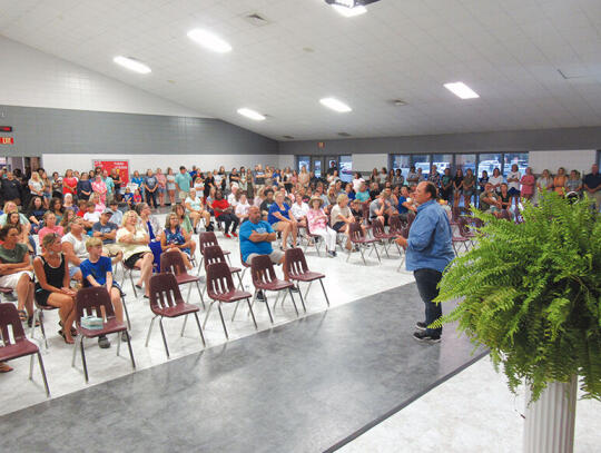 The Rev. Dr. Justin Gambrell of First Baptist Church in Blackshear leads a prayer vigil for Denison last week at Blackshear Elementary.