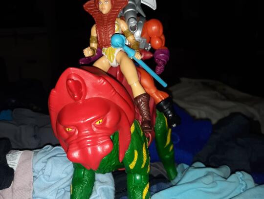 Teela and Snoutspout make their getaway on Battlecat.