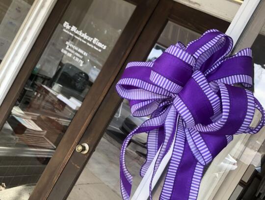 Local businesses are encouraged to display a purple ribbon in support of fallen soldier Sgt. Kennedy Sanders of Waycross.